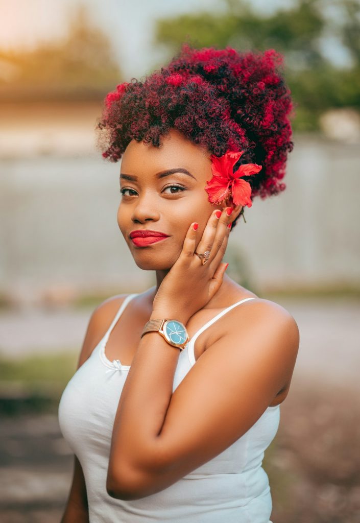 a-woman-with-a-red-flower-in-her-hair-njjdmul7wz4 BEAUTIFUL GIRL